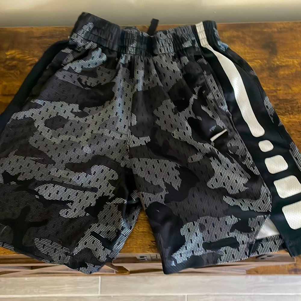 gray, black, and white camo nike dri-fit boy shorts-small